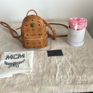 MCM Stark Bebe Boo Side Studs Backpack Visetos color Cognac